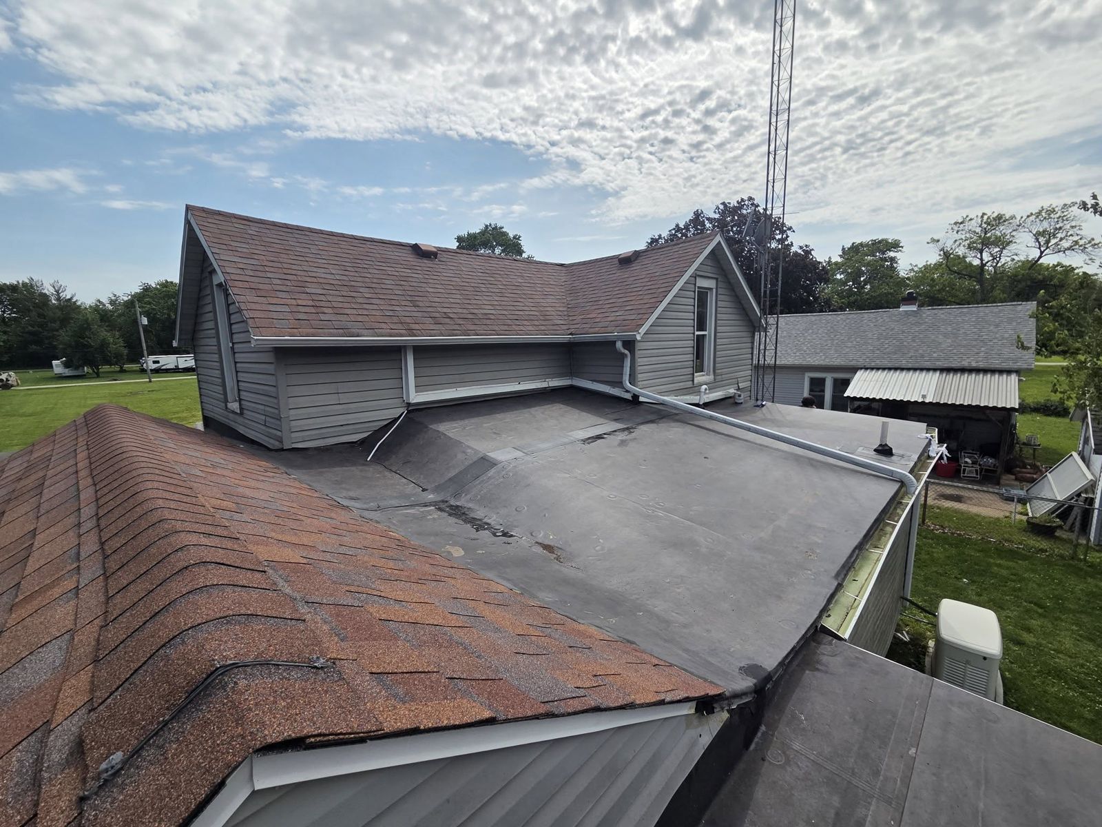 Low-slope and shingle roof sections